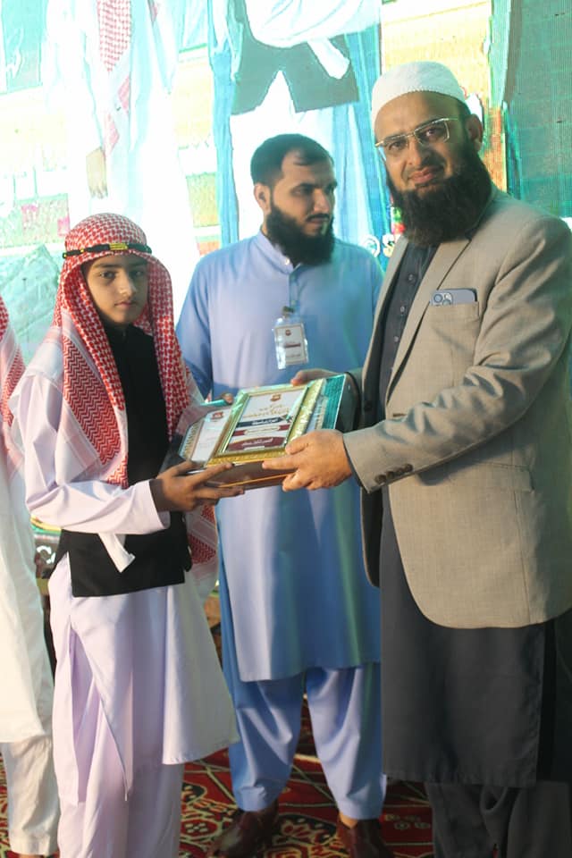 Person holding a green plant